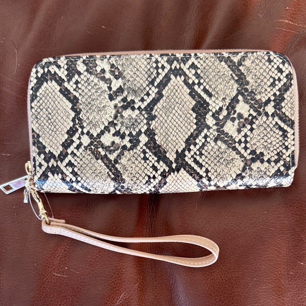A New Day Snakeskin Wristlet in Black and Cream